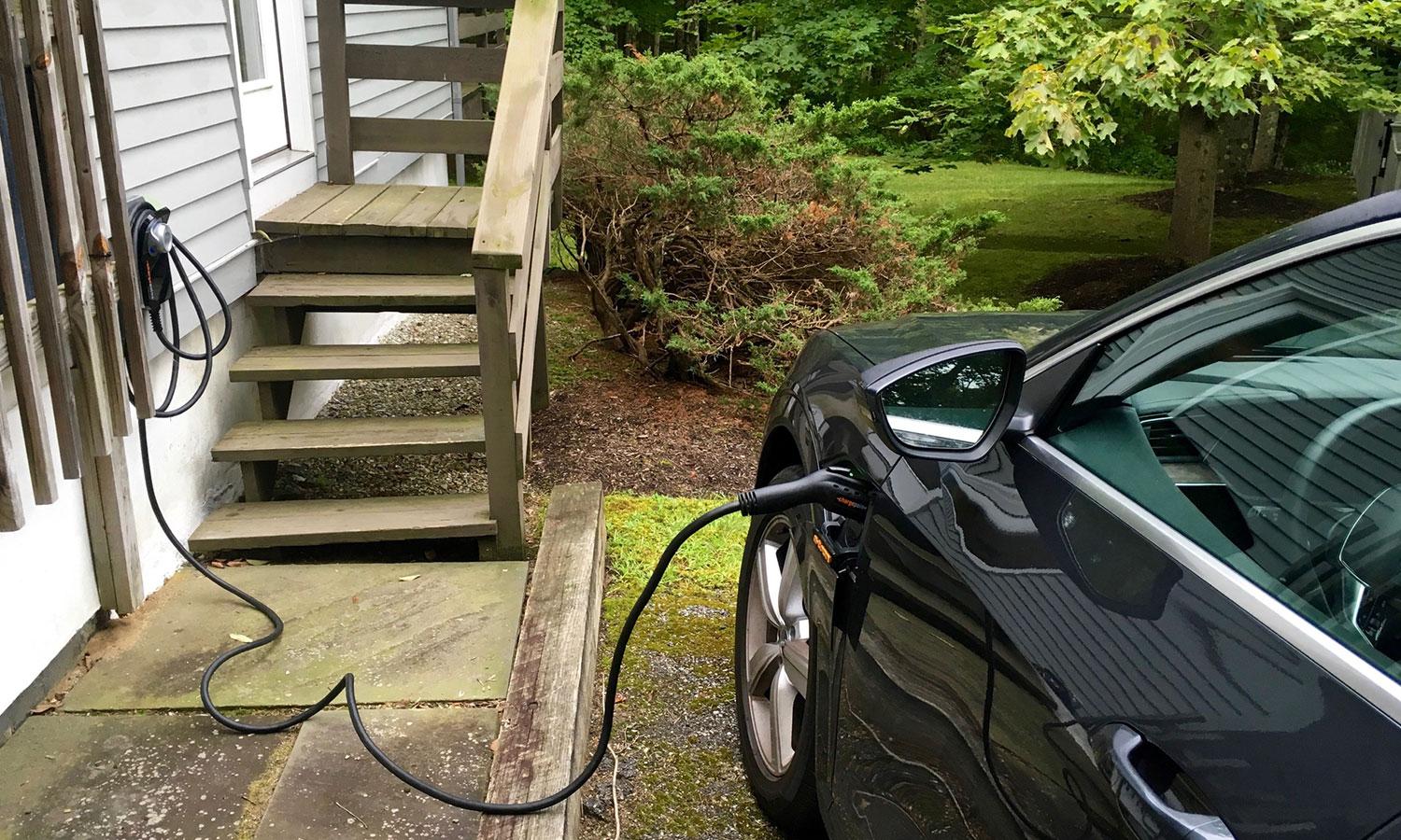 Electric vehicle charging at a home level 2 charger.