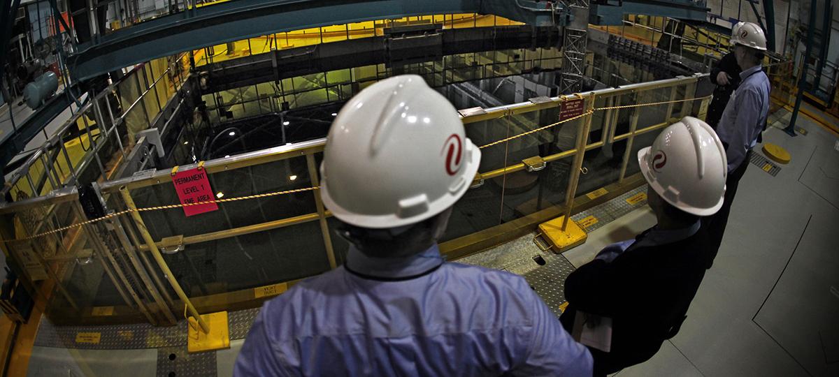 An oversight team inside of a nuclear power plant.