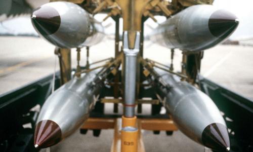 Four bombs suspended on a cart