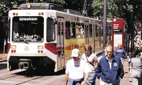 A light rail vehicle at a station outside Portland, OR