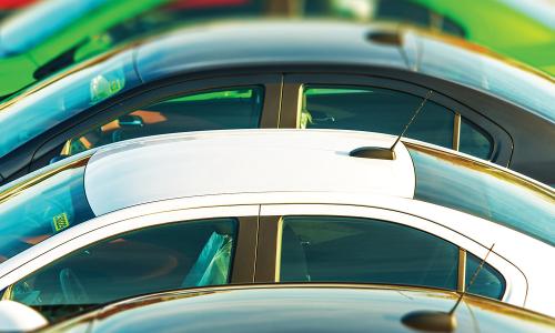 An array of colorful car roofs