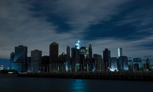 City skyline in blackout with only a few lights working