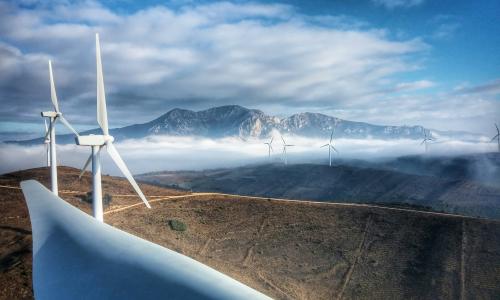 Mountain landscape with wind turbines