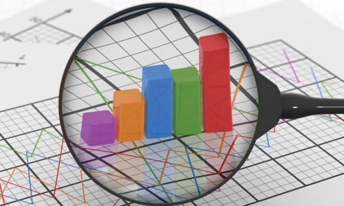 A magnifying glass magnifies a colorful line graph as a 3D bar chart