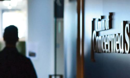 Person enters a door at the Union of Concerned Scientists office