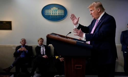 President Trump at a COVID-19 briefing with Anthony Fauci and Deborah Birx in the background