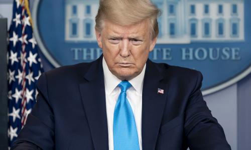 President Trump standing at a podium.