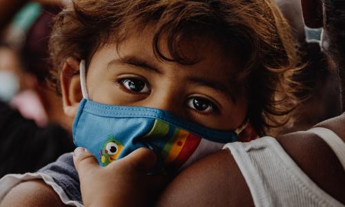 A child wearing a face mask.