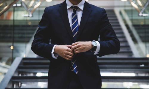 A corporate businessman in suit