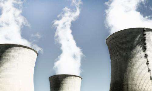 Steam rising from nuclear power plants.